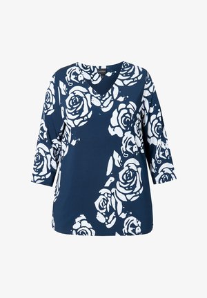 Top blu navy con scollatura a V e maniche 3/4, caratterizzato da un audace motivo di rose bianche. Realizzato in un materiale morbido e elasticizzato.