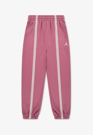 Pantalon de jogging mauve avec taille et chevilles élastiques, bande de dentelle blanche sur chaque jambe et petit logo Jordan blanc sur le haut de la cuisse.