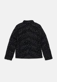 Black puffer jacket with a leopard pattern. Features long sleeves, a collar, and quilted texture with a slightly shiny finish.
