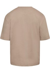 Beige cotton T-shirt with short sleeves, a crew neck, and a relaxed fit. Smooth texture with no visible patterns or accents.