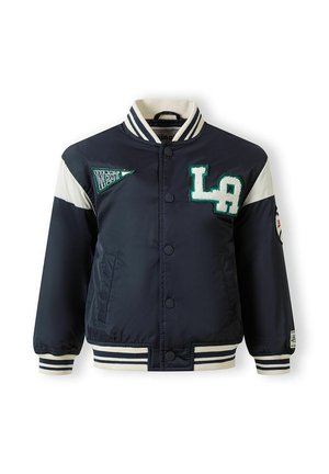 Granatowa kurtka varisty z białymi paskami na rękawach, naszywką "LA" na piersi, naszywką w kształcie proporca "WEST", z paskowanym kołnierzem, mankietami i dołem.