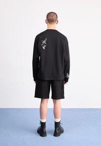Carhartt WIP FLOYD SHORT - Shorts di jeans - black