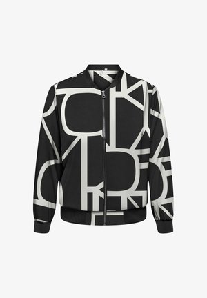 Une veste bomber noire présente un motif géométrique blanc contrastant, une fermeture éclair, des poignets et un ourlet côtelés en tissu doux.