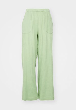 Helle grüne, weite Hosen mit einem elastischen Bund, strukturiertem Stoff und zwei vorderen Taschen. Das Design zeichnet sich durch eine lockere Passform aus.