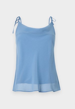 Haut caraco en mousseline bleu clair sans manches avec bretelles fines à nouer et ourlet légèrement évasé sur fond blanc.