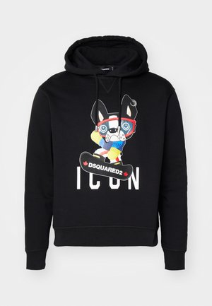 Hoodie noir avec un graphique à l'avant d'un chien de bande dessinée portant des lunettes de ski et un snowboard, comportant le texte "ICON" et "DSQUARED2" en blanc.