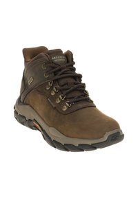 Brown waterproof hiking boot featuring a textured leather upper, metal eyelets, and a rugged rubber sole with traction grooves.