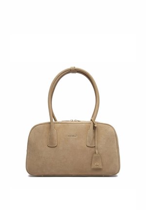 Béžová semišová kabelka s dvojitými rukojetmi, zlatým zipem, logem Gino Rossi na přední straně a malým zlatě zdobeným štítkem zavěšeným na jedné rukojeti.