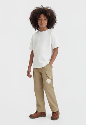 Versace INFORMAL PANT BROAD CLOTH MEDUSA PRINT UNISEX - Cargo hlače - sand castle/ivory