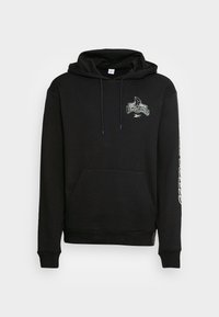 Černá mikina s kapucí vyrobená z bavlněné směsi, s přední kapsou, stahovací šňůrkou na kapuci a grafikou Power Rangers na hrudi a rukávu.