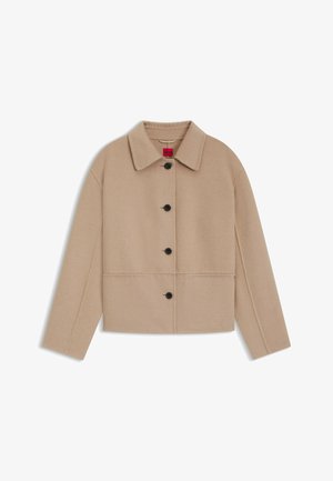 Beige Wollmischung cropped Jacke mit einem kragenförmigen Ausschnitt, sechs schwarzen Knöpfen und horizontalen Nähten. Verfügt über lange Ärmel und ein minimales Design.