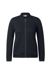 Veste noire zippée en tissu texturé, avec col et poignets côtelés, et poches latérales. Design simple et droit.