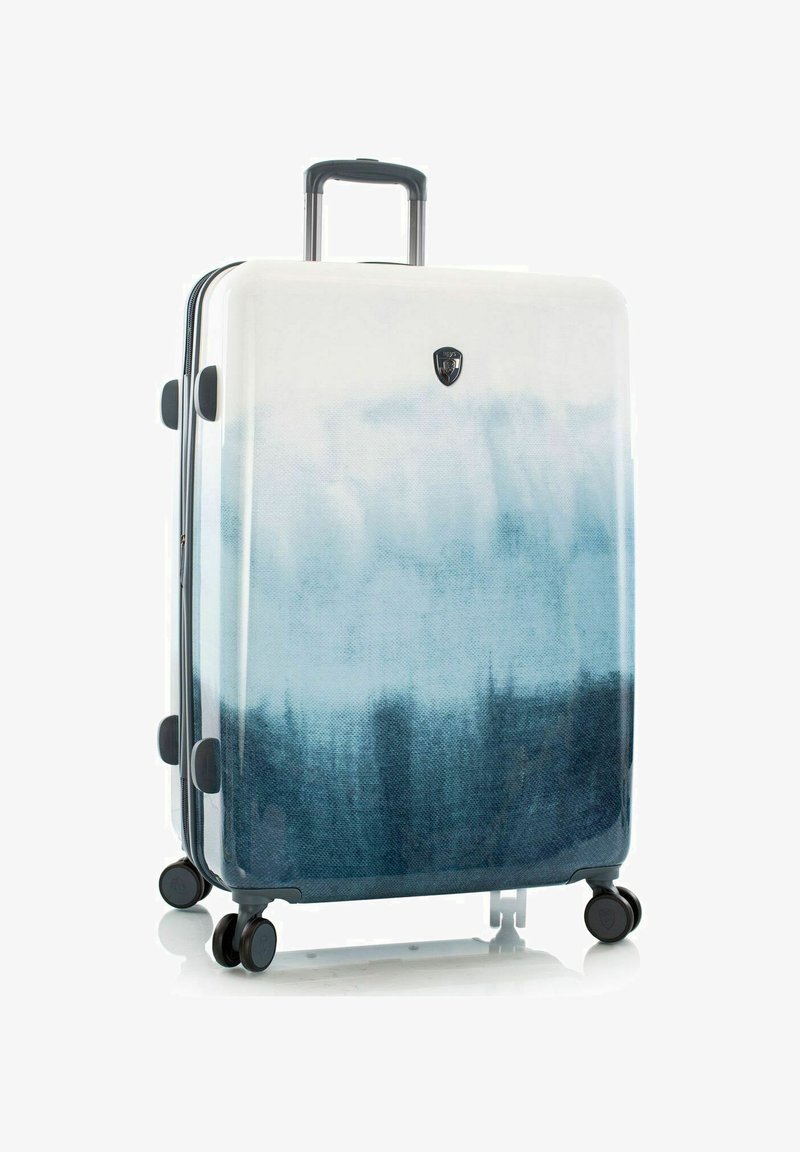 Hartschalenkoffer mit einem verlaufenden Blau- und Weißombre-Design, das oben hell und unten dunkler wird; ausgestattet mit vier leichtgängigen Rollen.
