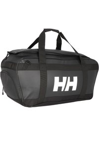Black duffel bag made of durable material, featuring two handles, a zippered top, and a prominent white logo. Large, rectangular shape.