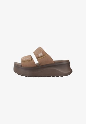 Brown platform slide sandal with two adjustable velcro straps and textured sole for grip.