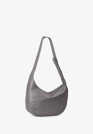 Gray leather shoulder bag with a curved design, adjustable strap, and a zippered compartment. Smooth texture and minimalist style.