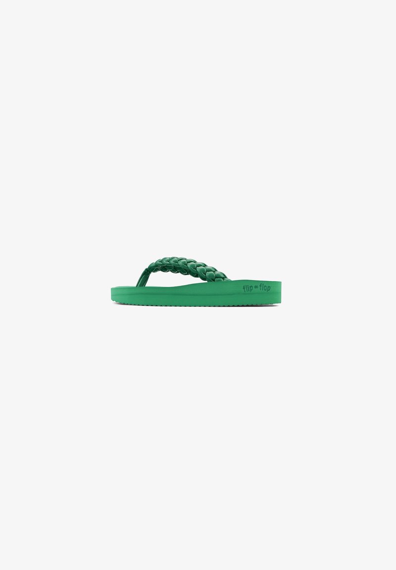 Green flip-flop with a braided strap design, made from rubber, featuring a textured sole and the brand name "flip * flop" embossed on the side.