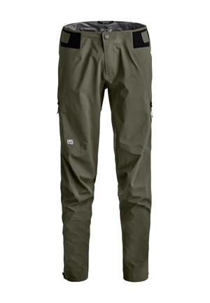 Herren-Outdoorhose in Olivgrün mit verstellbaren Klettverschluss-Taille, Reißverschlusstaschen an den Seiten und einem kleinen Logo am linken Oberschenkel.