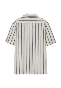 Chemise à manches courtes en crème avec des rayures verticales navy. Tissu doux avec une finition texturée. Présente un col classique et des fentes sur les côtés à l'ourlet.