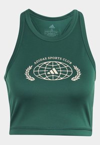 Top corto senza maniche verde realizzato in materiale liscio, con un logo ricamato color crema che presenta un design con un globo e alloro al centro.