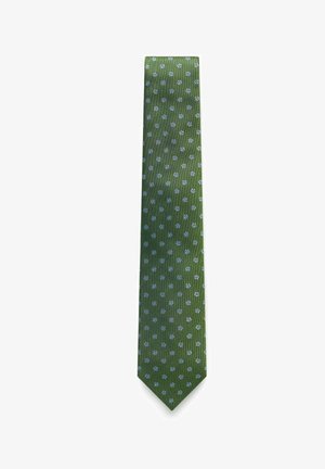 Vihreä solmio, jossa tasaisesti sijoitellut pienet vaaleansiniset kukkakuvioinnit valkoisella taustalla.