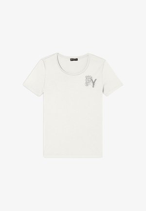 T-shirt bianco a maniche corte realizzato in cotone morbido. Presenta un collo rotondo e un logo decorato con strass argentati sul petto.