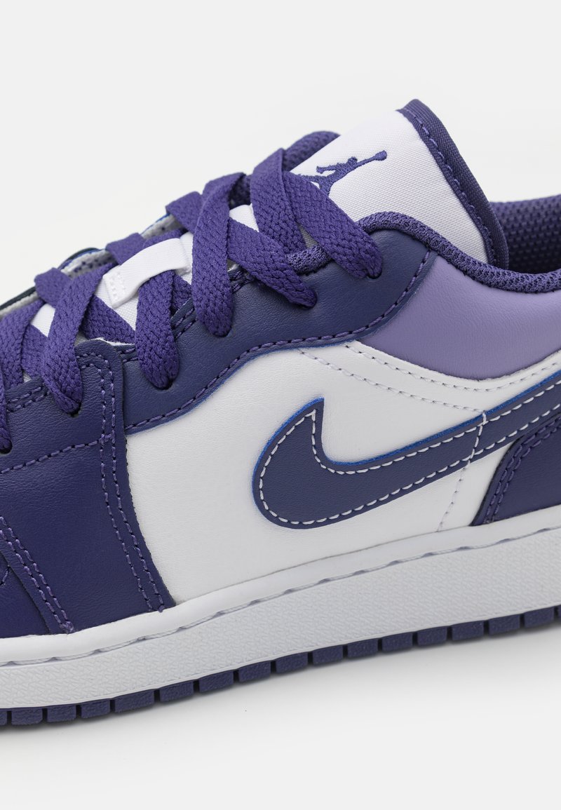 white and purple jordan 1 low