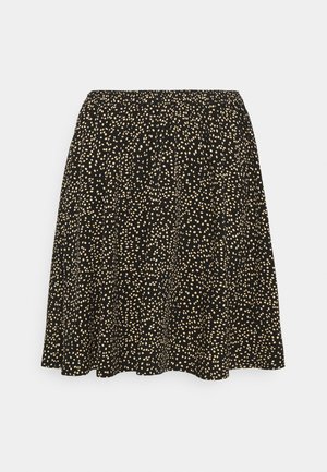Jupe noire avec petit motif de points irréguliers beiges, taille élastique froncée et légère évasement à l'ourlet.