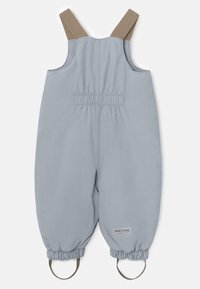 Grå barneoverall laget av mykt stoff, med elastiske ermer, justerbare brune stropper, og en etikett med "MINIATURE"-merke.