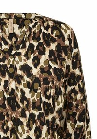 Leopardmönstrad topp i kräm, brunt och olivgrönt. V-ringning med avslappnad passform och långa ärmar, tillverkad av mjukt material.