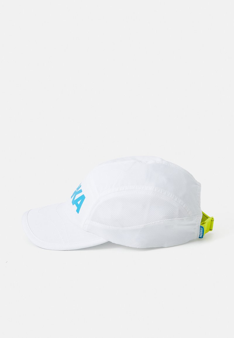 White cap with a curved brim, mesh side panels, and a large blue logo. Features an adjustable neon yellow strap at the back.