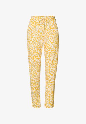 Gelbe Hose mit einem weißen abstrakten Muster, verfügt über einen Kordelzugbund und schmal zulaufende Beine. Hergestellt aus einem leichten Stoff.