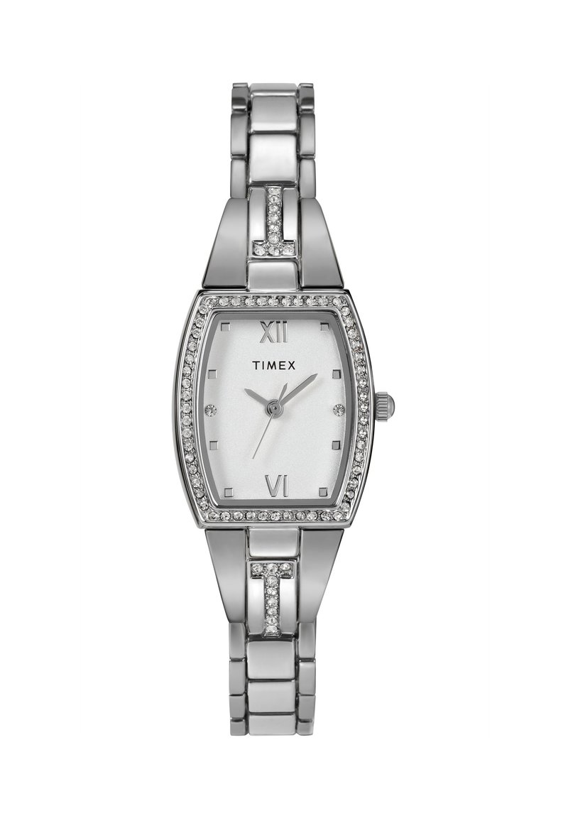 Srebrna ura iz nerjavečega jekla s pravokotno obliko, kvadratnim mehanizmom, belim številčnikom, kristalnimi detajli in povezovalnim zapestnicam s sijajnimi povezavami.