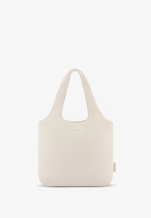 Beige taška na rameno s měkkou texturou, zaoblenými popruhy na ramena, velkým otvorem a minimalistickým designem s diskrétním logem.