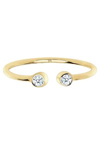 Guldtonet åben ring med to runde klare ædelsten, der har en glat, poleret overflade og et minimalistisk design.