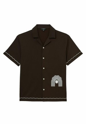 Dark brown short-sleeve button-up shirt with white wavy line details on edges and a white abstract arch design on the lower left side.