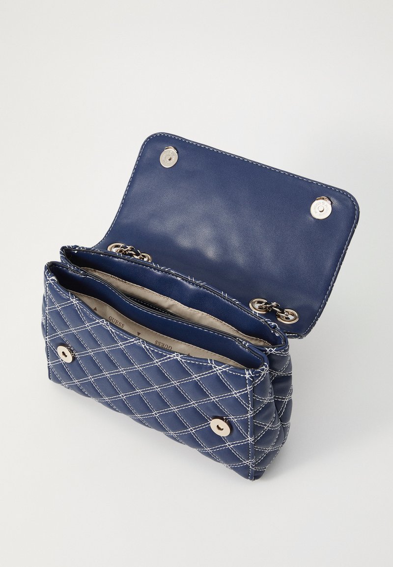 Buy GUESS Denim Victoria Small Quilted Cross Body Bag for Women