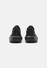Nike Performance ZOOMX INVINCIBLE FK 3 - Road running shoes - black