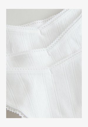 White lace-trimmed camisole featuring a textured design with narrow vertical stripes and diamond patterns, made from lightweight fabric.