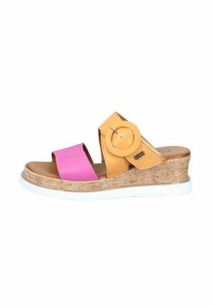 Open-toe wedge sandal with cork sole, pink front strap, and orange ankle strap featuring a large circular buckle.