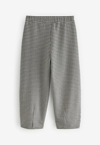 Mustavalkoiset houndstooth-kuosiset housut, joissa on joustava vyötärö, kapeneva lahjemuotoilu ja teksturoitu kangaspinta.