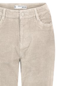 Beige corduroy broek met een voorste knoop, rits, riemlussen en zijzakken, gemarkeerd als maat medium door het merk EIGHT2NINE.