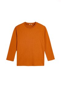 Pitkähihainen paita teksturoidusta palo-oranssista kankaasta. Ominaisuuksina pyöreä kaula-aukko ja suora leikkaus ilman näkyviä kuvioita tai koristeita.