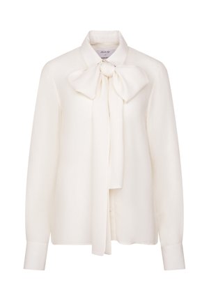 Witte blouse met lange mouwen van lichtgewicht stof, met een grote strik bij de kraag en knoopjes aan de manchetten. Soepele textuur.