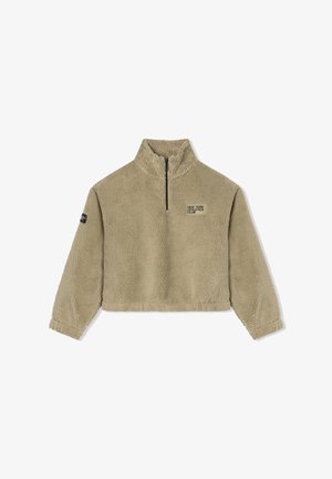 Beżowy skrócony polarowy sweter z suwakiem na ćwierć, z logo "New York Athletics Club" na klatce piersiowej oraz naszywką na lewym rękawie.