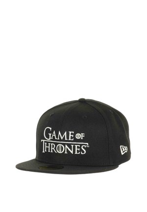 Black baseball cap featuring "Game of Thrones" logo in white embroidery. Structured shape with a flat brim and New Era logo on the side.