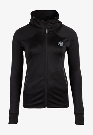 Zwarte zip-up hoodie met een hoge hals en een aansluitende pasvorm. Heeft een klein grijs grafisch logo op de borst en reflecterende zijaccenten.