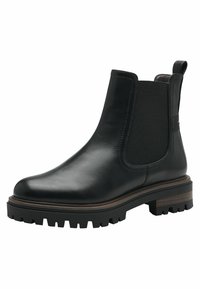 Botín Chelsea de cuero negro con paneles laterales elásticos, superficie texturada, suela rugosa con ranuras y una lengüeta para facilitar el uso.