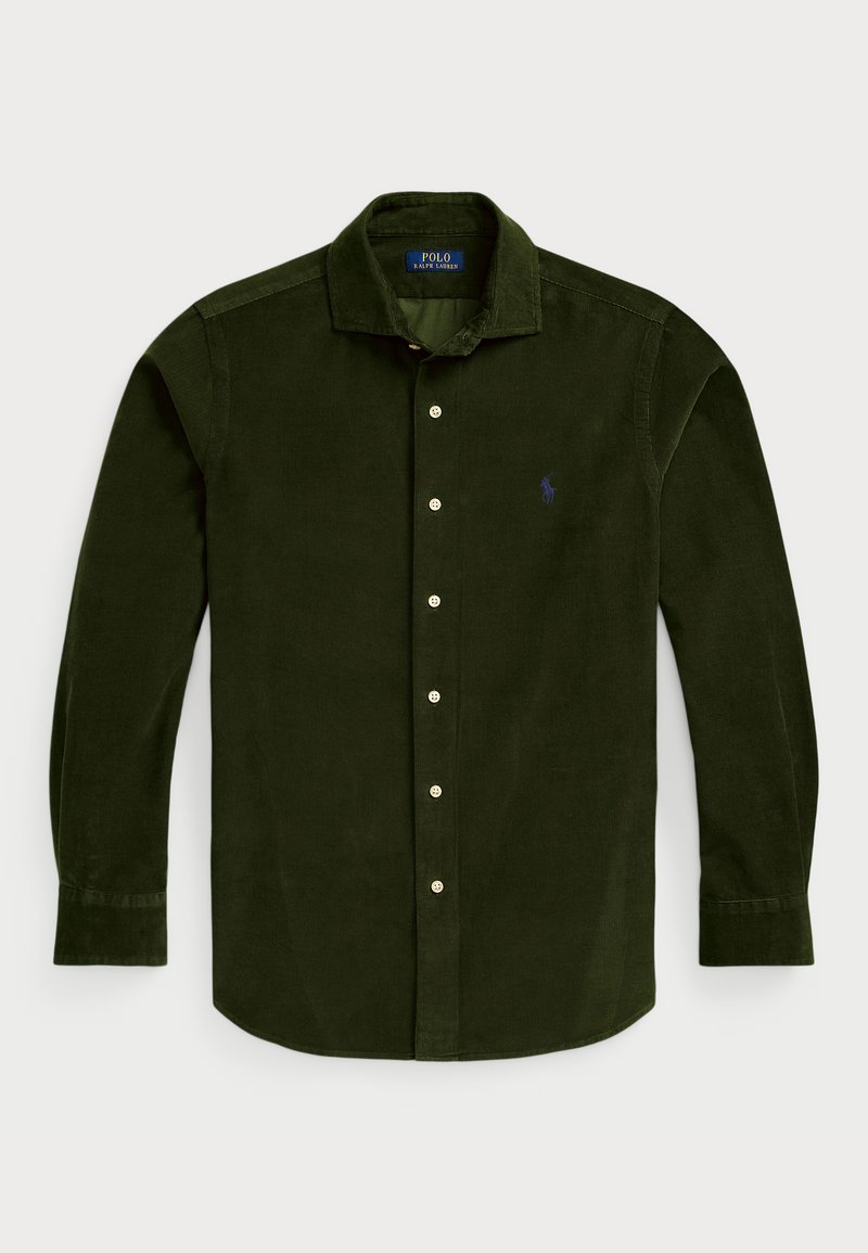 Chemise en velours côtelé vert foncé à manches longues, col boutonné, patte de boutonnage à l'avant et un petit logo bleu sur la poitrine gauche.