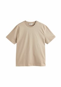 Camiseta de algodón beige de mangas cortas, con cuello redondo, textura suave y sin patrones ni acentos visibles. Diseño clásico y recto.